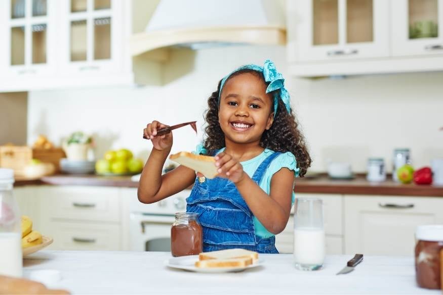 kid making snack